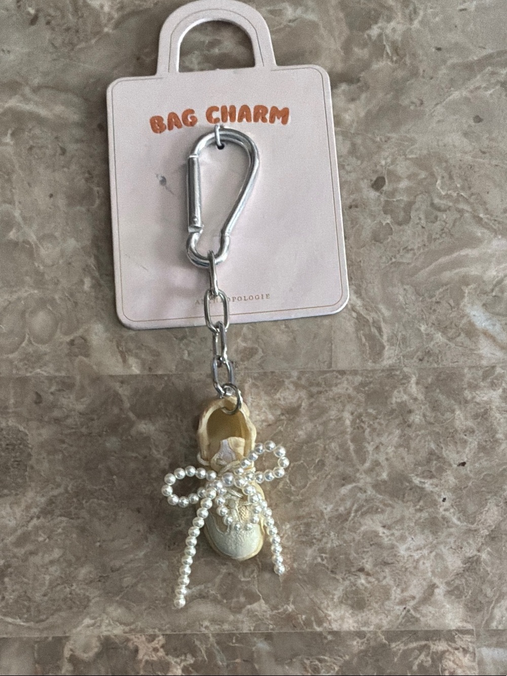Anthropologie Pearl Bow Tennis  Shoe Bag Charm - Pale Yellow